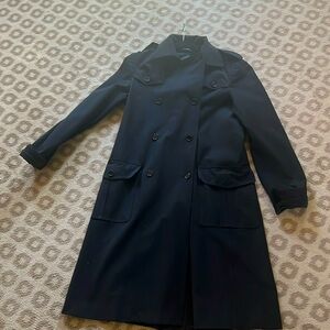 Black theory women trench coat size medium in good but worn condition.